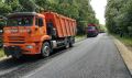 Очередь из самосвалов с горячим асфальтом выстроилась на дороге Ольшанец — Каменка в Задонском округе